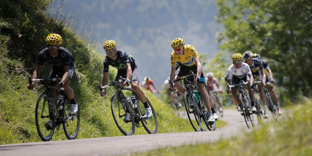 Chris Froome (yellow jersey) descends Val Louron-d'Azet pass with Alejandro Valverde (second) and Alexander Quintana ( in white). Photo / AP