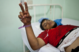 One of former President Mohamed Morsi's supporters who was wounded in a deadly clash in Cairo which claimed at least 51 lives. Photo / AP