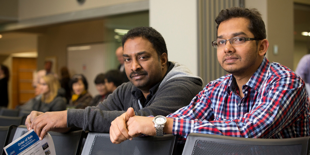 Ram and Zabee Mohan check out the action at Barfoot & Thompson's city auction rooms. Photo / Greg Bowker