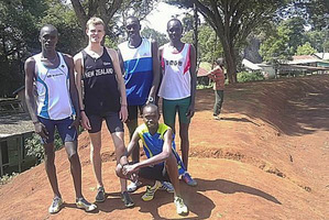 New Zealand distance runner Jake Robertson in Kenya with his training partners. Photo : NZPA.