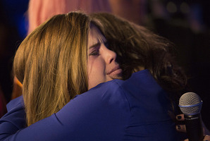 Cassie Henderson hugs Jackie Thomas after being eliminated from The X Factor.