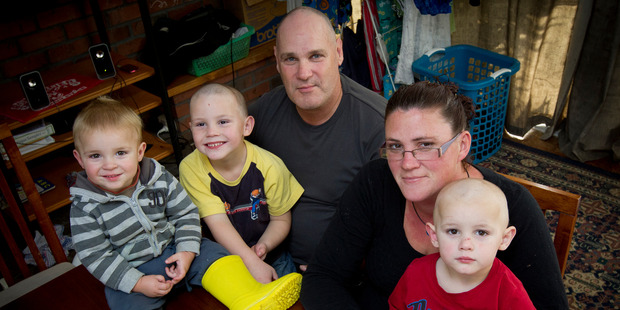 Craig and Carla Bradley, with their sons, from left, Alex, Cane and Jayden, now have the added stress of job hunting for Mrs Bradley. Photo / Sarah Ivey