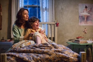 Lili Taylor and Joey King are confronted by the unexpected in The Conjuring.