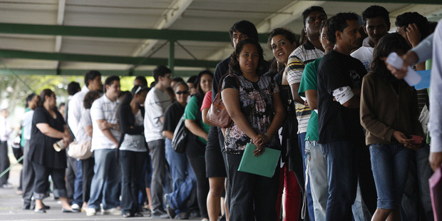 A queue of applicants waiting for job interviews at an Auckland supermarket. Lack of job growth continues to weigh on Auckland's recovery. Photo / Christine Cornege