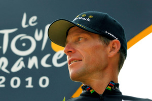 In this July 25, 2010, file photo, Lance Armstrong looks back on the podium after the 20th and last stage of the Tour de France. Photo / AP.