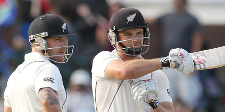 Daniel Flynn, right, signals to the umpire a review on his LBW dismissal as New Zealand's captain Brendon McCullum, left, looks on during day two of their second cricket test match. Photo / AP.