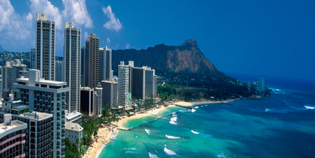 Waikiki Beach on Hawaii's Oahu Island is a cold-climate visitor's idea of bliss. Photo / Getty Images