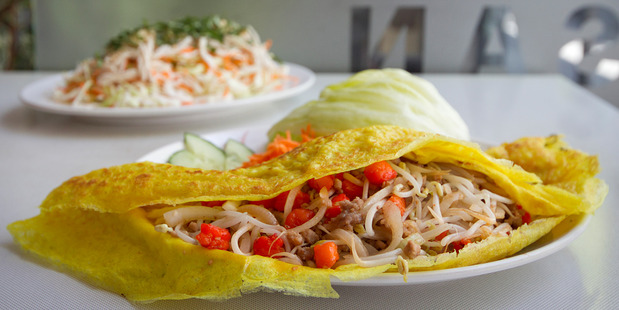 Hansan's pork and prawn stuffed pancake (front) and chicken salad entree. Photo / Natalie Slade
