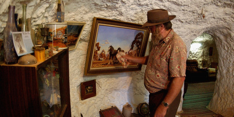 A resident of Outback New South Wales remains cool in his underground home in White Cliffs despite the searing heat outside. Photo / Getty Images