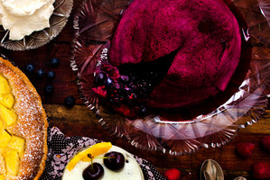 Summer berry pudding with rosewater cream. Photo / New Zealand Herald
