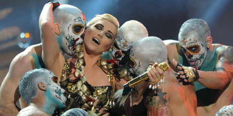 Ke$ha, please give up your day job, you're setting a bad example to our children. Photo / AP