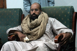 Saif al-Islam is seen after his capture in the custody of revolutionary fighters in Zintan, Libya. Photo / AP