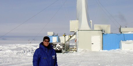 Antarctic Research Centre director Tim Naish with the drill rig that pierced the Ross Ice Shelf. Photo / NZ Herald
