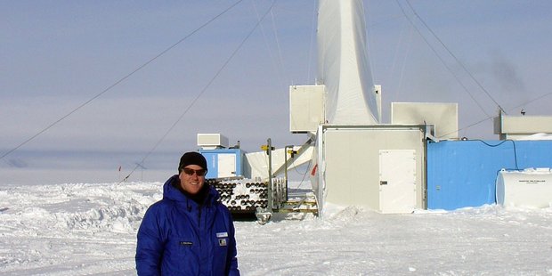Antarctic Research Centre director Tim Naish with the drill rig that pierced the Ross Ice Shelf. Photo / NZ Herald