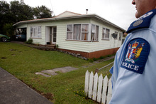 Dargaville Police Senior Sergeant Rob Nordstrom outside the Tirarau Street property where two police officers were assaulted. Photo / John Stone