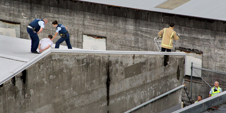 A man was arrested and likely to face charges after trying to evade police by running along rooftops in the Hastings CBD yesterday. Photo / Warren Buckland