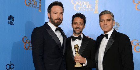 Ben Affleck, left, and Argo producers Grant Heslov and George Clooney. Photo/AP