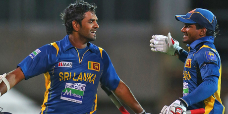 Lahiru Thirimanne of Sri Lanka celebrates with Kushal Janith Perera after scoring the winning runs and his century. photo / Getty Images