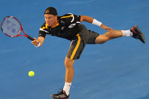 Lleyton Hewitt of Australia plays a forehand in his first round match against Janko Tipsarevic of Serbia. Photo / Getty Images