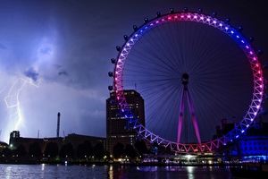 The London Eye is lit up in the national colours of red, white and blue to mark the royal birth. The new Prince faces a very long wait to take his turn on the throne.
