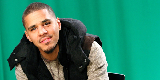 J Cole has apologised for using an offensive lyric in a song with Drake. Photo / AP
