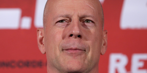 Bruce Willis put a UK interviewer through his paces while promoting the film Red 2. Photo / AP