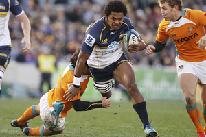 Henry Speight of the Brumbies is tackled during the Super Rugby Qualifying Final match between the Brumbies and the Cheetahs. Photo / Getty Images.