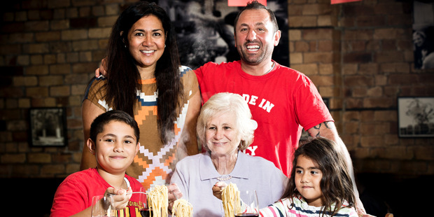Gina's owner Joyce and Alessandro Fantoni share a table with Gina Maio and their two children, Massimo and Tia. Photo / Babiche Martens