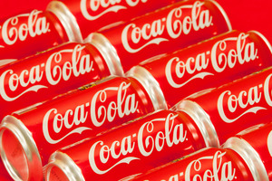 Coke's New Zealand division today starts an advertising campaign which expressly mentions the obesity problem and highlights steps it will take to tackle the issue. Photo / AP
