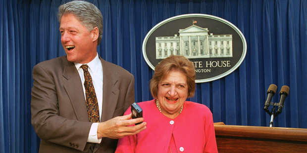 President Clinton "interviews" UPI White House correspondent Helen Thomas in the White House briefing room in Washington. Photo / AP