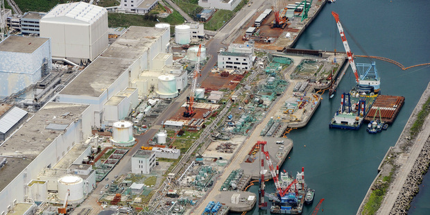 Aerial photo taken on July 9, 2013 shows reactor buildings Unit 2, left, and Unit 1 at Fukushima Dai-ichi nuclear power plant in Okuama, Fukushima Prefecture. Photo / AP