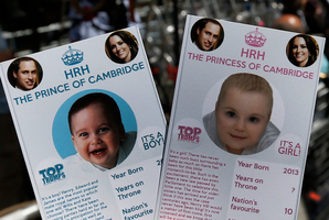 Cards depicting the 'royal baby' either as a boy or a girl.Photo / AP