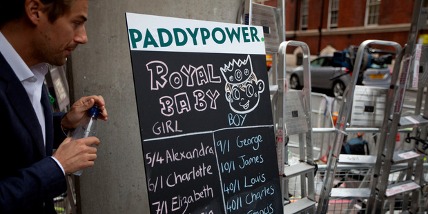 A bookie showing odds on different names for the royal baby outside St. Mary's Hospital Lindo Wing.Photo / AP