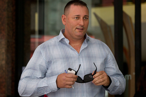 Businessman Phillip John Smart leaves the Auckland District Court where he is facing charges for misrepresenting customers buying water filters. Photo / NZ Herald