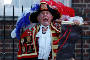 Tony Appleton, a town crier, announces the birth of the royal baby, outside St. Mary's Hospital exclusive Lindo Wing.Photo / AP