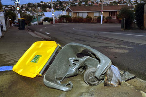 A wheelie-bins burnt in Dunedin. Photos / Stephen Jaquiery