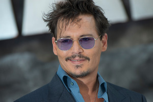 Johnny Depp has hinted that he could retire from acting after calling the profession 'insane'. Photo / AP