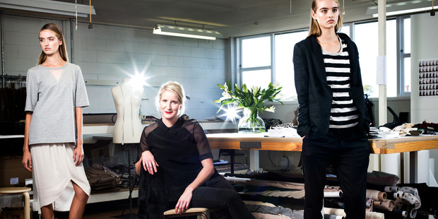 Fashion designer Juliette Hogan in her studio, with models Baylee and Kelsey wearing pieces from her summer collection. Photo / Babiche Martens