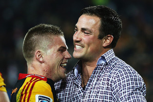 Gareth Anscombe celebrates with injured teammate Richard Kahui. Photo / Getty Images