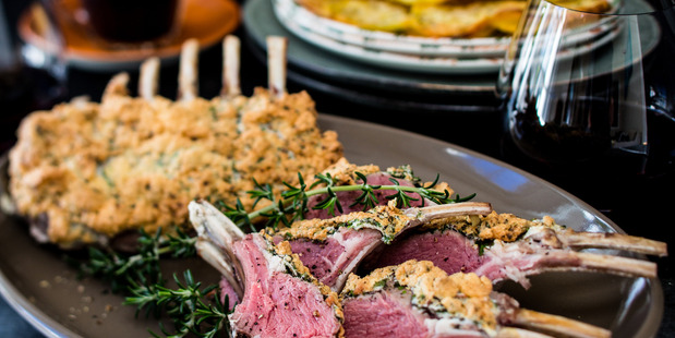 Rack of lamb with herb souffle and mulled wine sauce. Photo / Babiche Martens