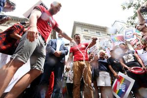 Gay rights activist dump Russian vodka during a demonstration in front of the Russian consulate in New York. Photo / AP