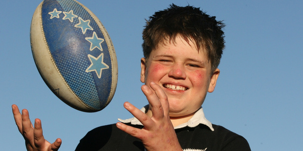 Raybane Hume-Kinzett, 11, has won a nationwide competition to run on the ball at the upcoming All Black vs Australia Bledisloe Cup match. Photo / APN