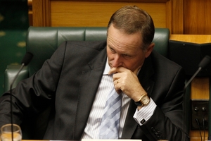 John Key is under pressure but still popular in the polls. Photo / Mark Mitchell