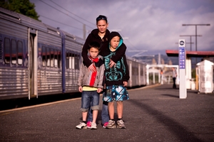 Jamie-Lee Johnson with sons Jade, left, and Justin at Te Mahia railway station. Photo / Dean Purcell