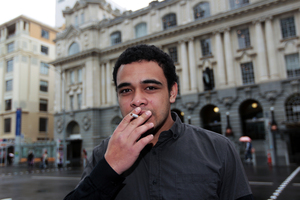 Feke Valu is not put off smoking by pictures of diseased organs but would consider quitting over the smell. Photo / Doug Sherring