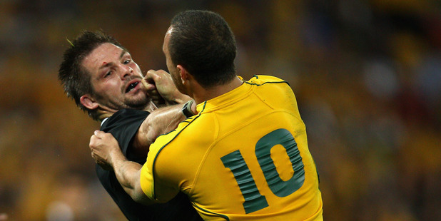The confrontations between Richie McCaw and Quade Cooper typify the nastiness thathas crept into tests between the All Blacks and Wallabies. Photo / Getty Images
