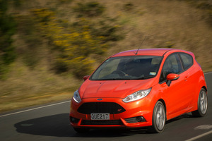 The Ford Fiesta ST is tastefully tweaked, with Recaro seats, a fat little steering wheel and an integrated roof spoiler. Pictures / Ted Baghurst