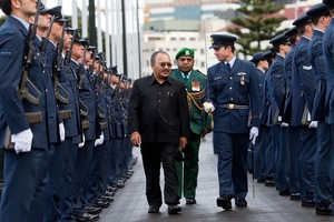 Papua New Guinea Prime Minister Peter O'Neill (left) inspects a guard of honour at Parliament. Photo / Marty Melville
