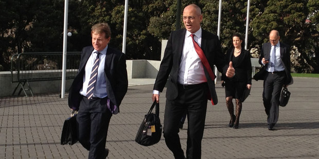 Fonterra chairman John Wilson (l) and chief executive Theo Spierings arrive at the Beehive for a ministerial meeting this morning. Photo / Audrey Young