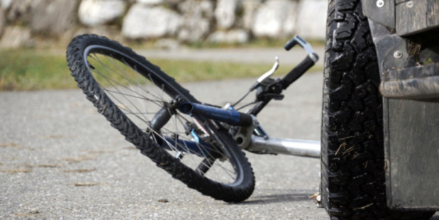 A young boy showed is bravery after his bike was hit by a van. Photo / Thinkstock